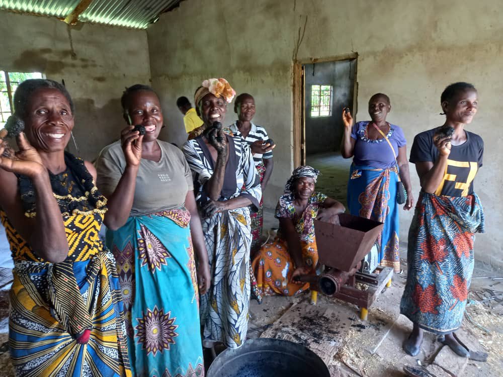 At last Grace’s briquette project has begun production. Waste husks from our #FairTrade #KilomberoRice is now being turned into cooking fuel, saving travel and tree cutting. The project also acts as a social meeting space for the women. bit.ly/3JU6VH7