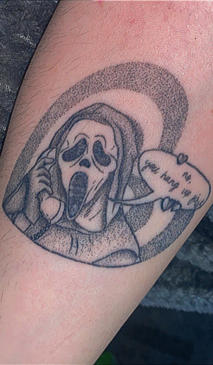 BethanySimmoni1's tweet photo. @Memeulous It says “no, you hang up first”. Who doesn’t love a horror Tattoo? https://t.co/FTVwxMyTdg