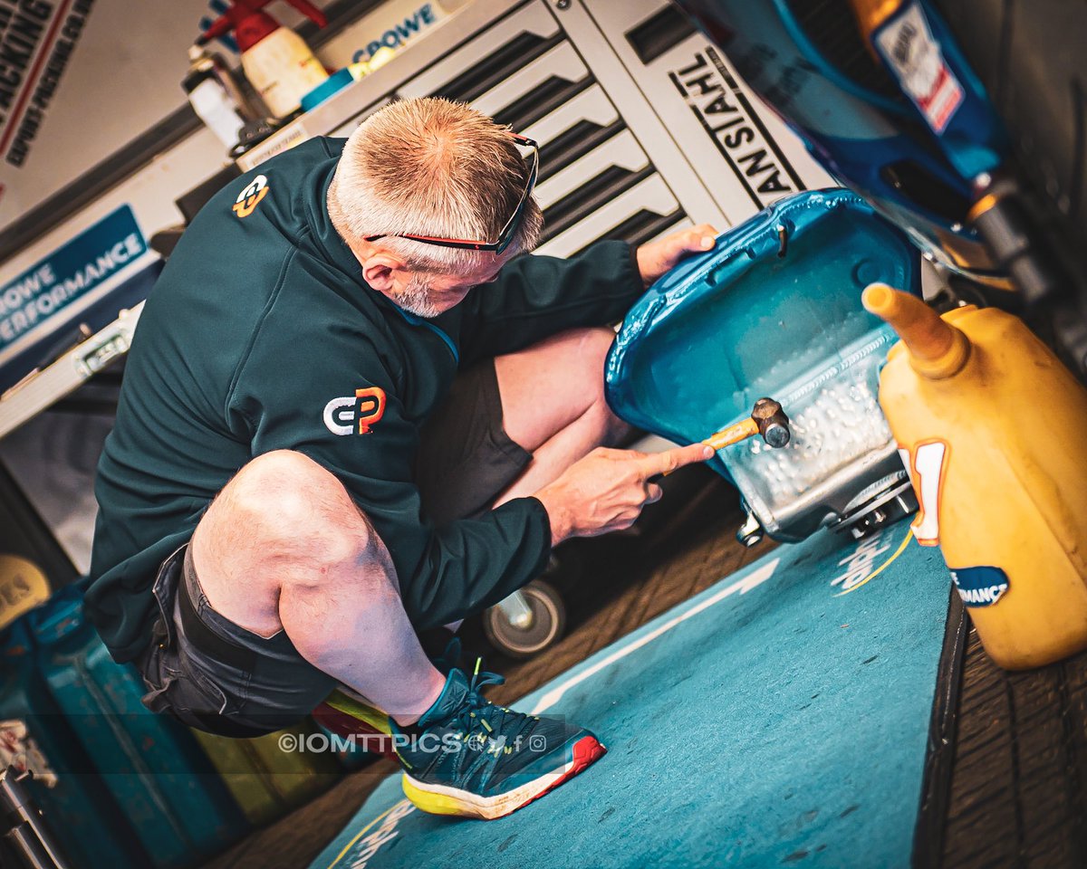 iomttpics's tweet photo. One thing I love at TT & MGP is wandering around the paddock getting shots of people working on bikes. Here some from 2022. #paddockpics #tt #mgp #tinkering https://t.co/0B6bo6xjPW