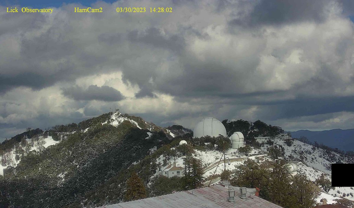 New snow atop Mount Hamilton above San Jose, CA (image from the HamCam webcam). There's been snow on the ground there for five weeks straight, by my reckoning: if not a record, first time that's happened in many years. Hopefully, environmental scientists will document its impact!