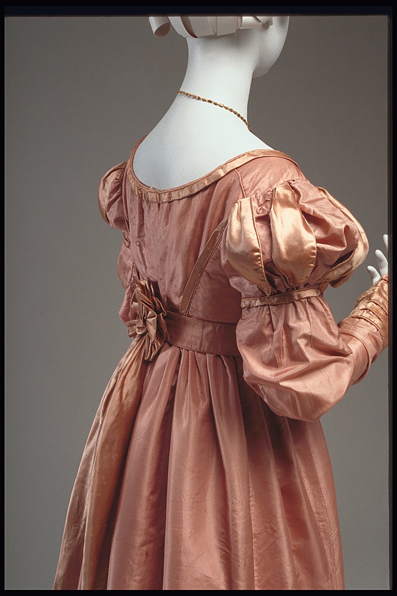 LaurenCDeutsch's tweet photo. Today's #ootd in #Cherryblossompink is this 1823-5 gown. The Renaissance inspired slashed balloon sleeves, ribbons mimicking a bow on the bodice, and the little bow in the back give off a highly romantic feel.  @MuseeMcCordStew #Fasionhistory https://t.co/R1xwbtwR1l
