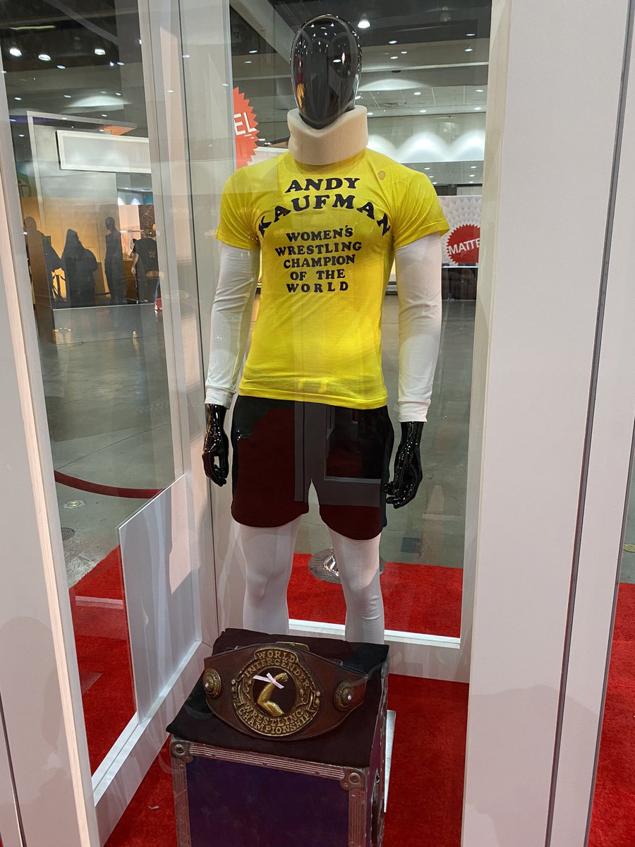 evanwecksell's tweet image. Of all the things at the #wrestlemania #superstore, this Great Neck comedian couldn’t get enough of this other #greatneck #comedian. #andykaufman #wwe #halloffame #taxi #latka