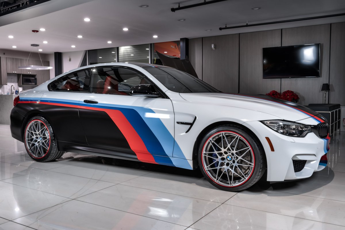 SupercarReport's tweet photo. Check out this BMW M4 Competition with a rare 6-speed manual, competition package, executive package, and custom M color scheme exterior wrap. Only 13k miles, it's a perfect daily driver for the thrill seeker in you!" #BMW #BMWM4

Learn more: https://t.co/CvYCtcvkwU https://t.co/LW9hDID6EZ