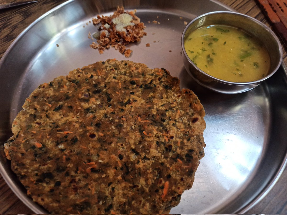 Rohinips1's tweet photo. A mixed veg Paratha (moringa & methi leaves, carrot, onion & capsicum) with jaggery and plain dal. This will be followed with a huge glass of sattu lassi! Weird combo? Blame it on weather π₯΅
#toohottocook #fridaylunch https://t.co/MfcNVMbeeB