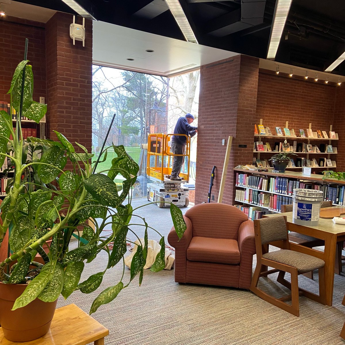GburgColLibrary's tweet photo. Noticing some extra noise in the library, or feeling like you need a jacket on the main level? There's a reason! Last night a main level window shattered, and today our fantastic facilities crew is working to get things patched up. In the meantime, please mind the caution tape! https://t.co/OG6qNvGs8E