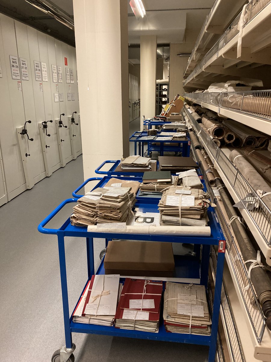 Assistant Kathryn's entry for #TypicalDay

Strongroom B at the end of a typical day. Trolleys filled and at the ready for tomorrow’s researchers. 
#Archive30  
#TrolleyTastic