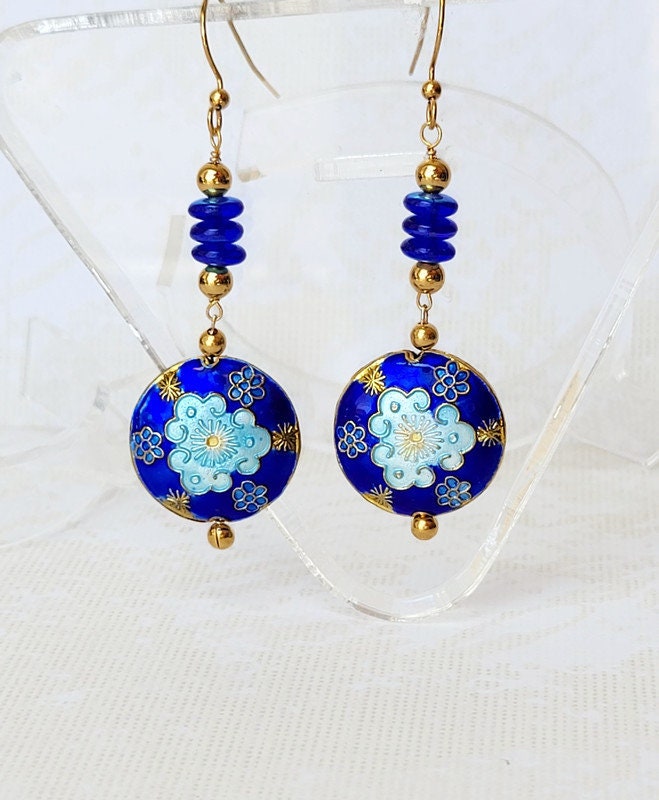 Really love this, from the Etsy shop AssiaDesigns. etsy.me/3U1Ytu8 #etsy #goldearrings #royalblueearrings #blueearrings #royalblueandgold #blueandgold #cloisonneearrings #giftforher #giftforwoman #giftformom