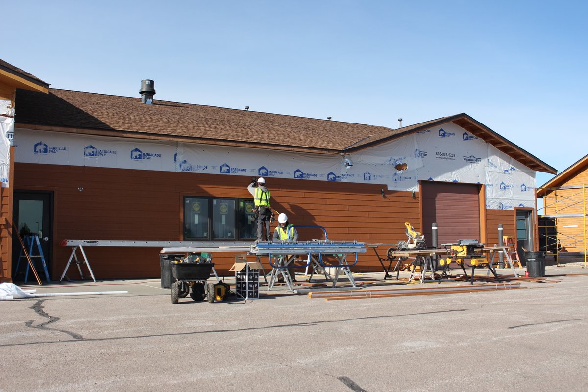 BlackHillsNF's tweet photo. #ForestFeatureFriday: Mystic Ranger Station/Rocky Mountain Research Station building, a nearby fire warehouse, RMRS garage, & the Great Plains Dispatch Center are getting a facelift. https://t.co/wi93vx9AD0 https://t.co/nZVJW1RnbW
