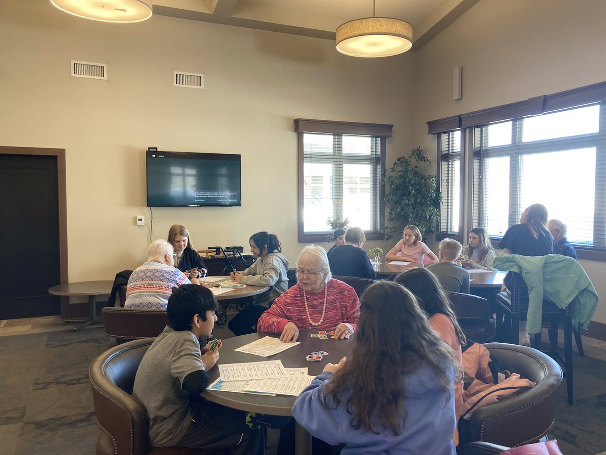 EventideSLC's tweet photo. Fifth graders from Independence Elementary visited #EventideFargo apartments to play “Getting to Know You UNO,” encouraging the two generations to have meaningful connection. The events were organized by a group in the @FMWFChamber’s Leadership FMWF, including @EventideLaura https://t.co/1vd1u61zMS