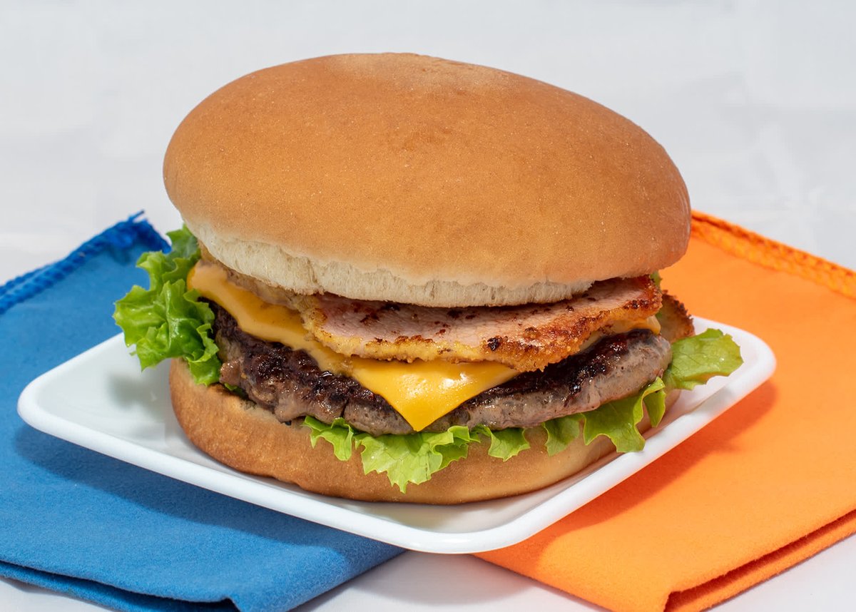 Why settle for a plain old burger when you can have a peameal bacon burger that'll make your taste buds dance? 🕺🍔💃