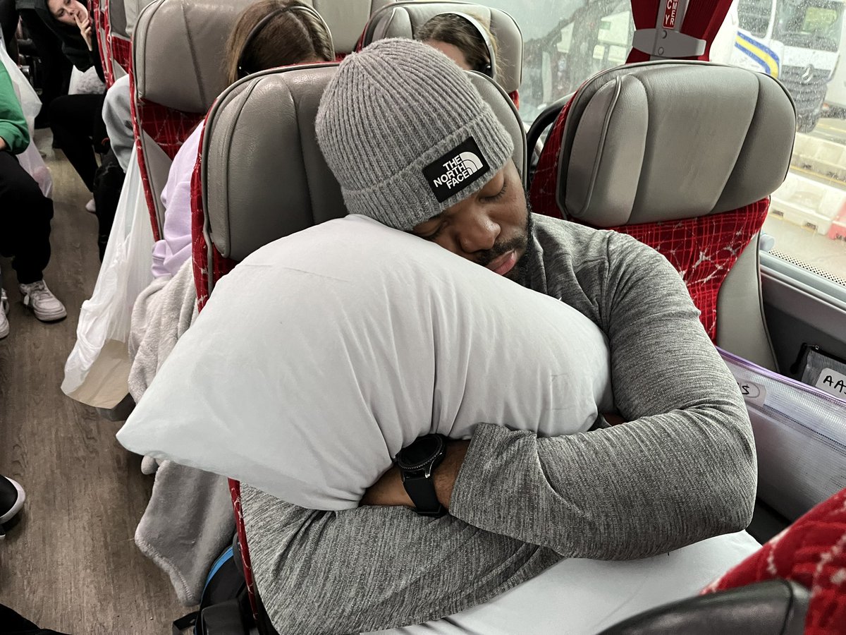 Mr Roach-Williams getting comfortable waiting at Dover <a href="/ESJSKI23/">ESJ Ski Trip</a>