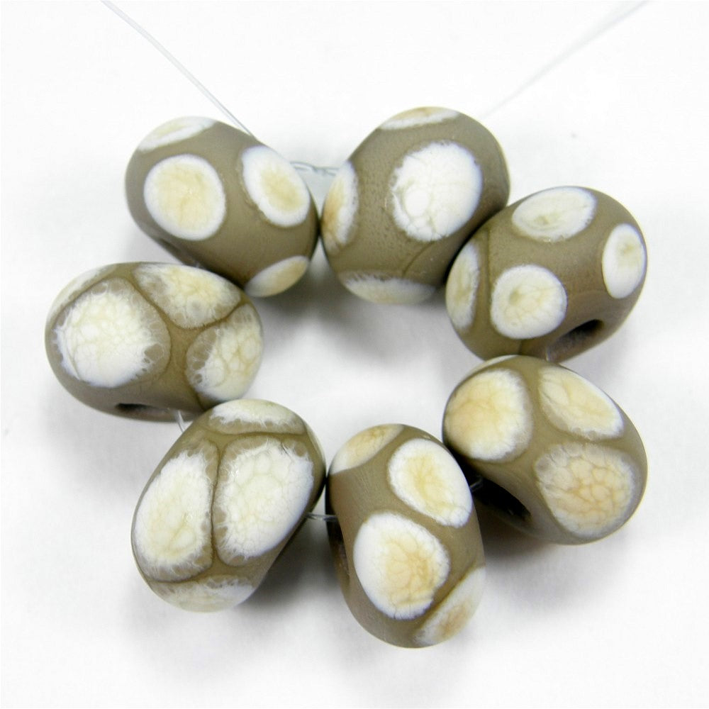 Looking for rustic beads for your next jewelry project? Get some matt avocado green handmade lampwork glass beads with ivory dots. buff.ly/40wXcxu via @covergirlbeads #sdftt #HandmadeLampworkBeads #LampworkGlassBeads