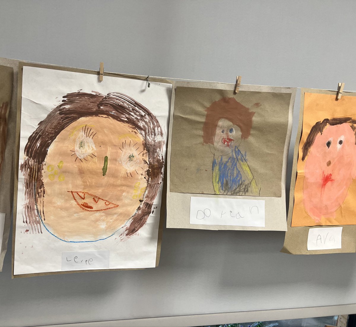 __Miss_D's tweet photo. These Nursery self portraits bring me so much joy. They picked the colours, canvas and tools to portray themselves. What great artists they are. @GLFSchools @LongfordParkSch https://t.co/XVzUaugmL5
