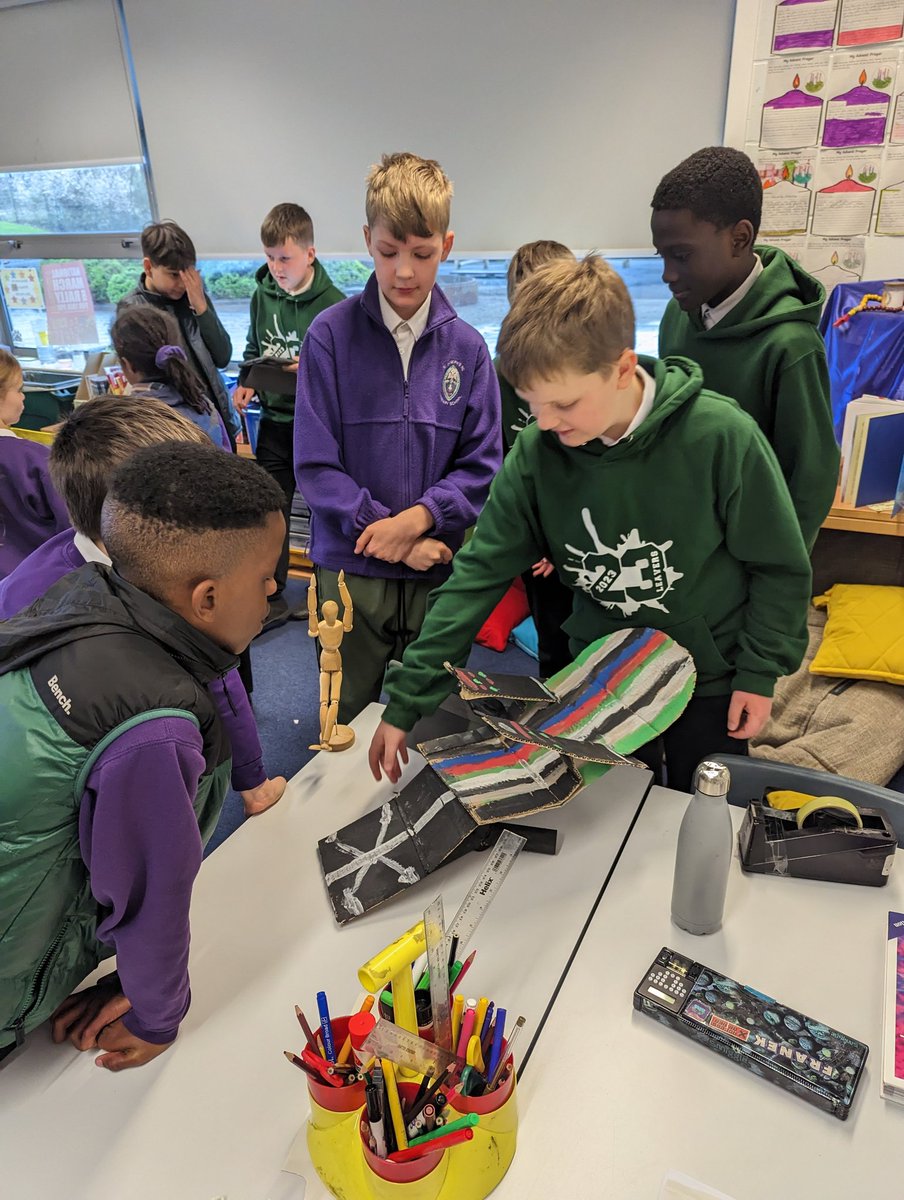 St_JosephsP6's tweet photo. Primary 7J design engineers in action today, presenting their designs to their impressive audience from Primary 5/4! #STEMeducation #dysonchallenge @stjosephsedin https://t.co/eQZ5SexWA2