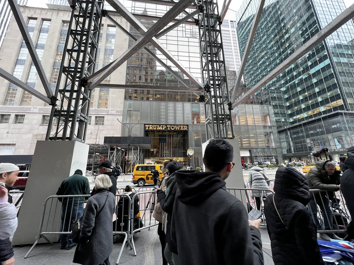 NYCRobyn's tweet photo. Outside trump tower NO ONE IS ABOVE THE LAW. #NYC #LockHimUp #IndictedDonald https://t.co/crOWBBirAG