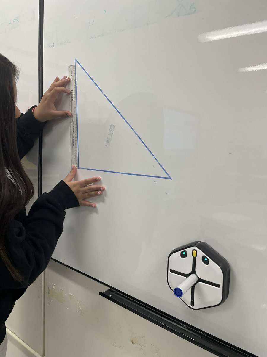 7th graders had so much fun creating similar figures with robots today! A lot of collaboration & problem solving, especially for those triangles! #middleschoolmath @LCPS_Math @SRMS_Official