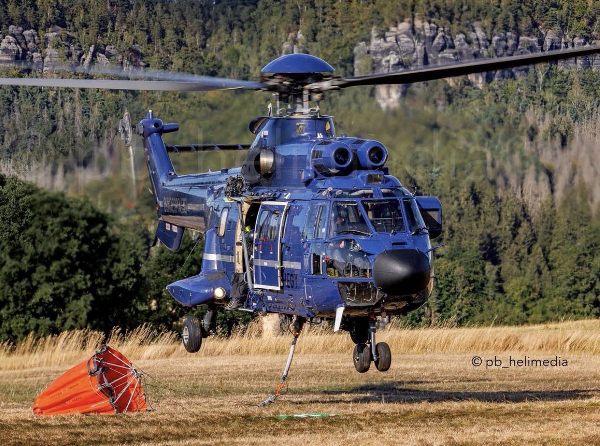 aerialfiremag's tweet photo. A German Federal Police AS332L1 picks up a Bambi Bucket during a recent multi country fire response. Photo by @pb_helimedia.

Tag us at @aerialfiremag to feature your image on social media. Email your shots to news@aerialfiremag.com to be featured in our print magazine. https://t.co/qsgwhHwhfu