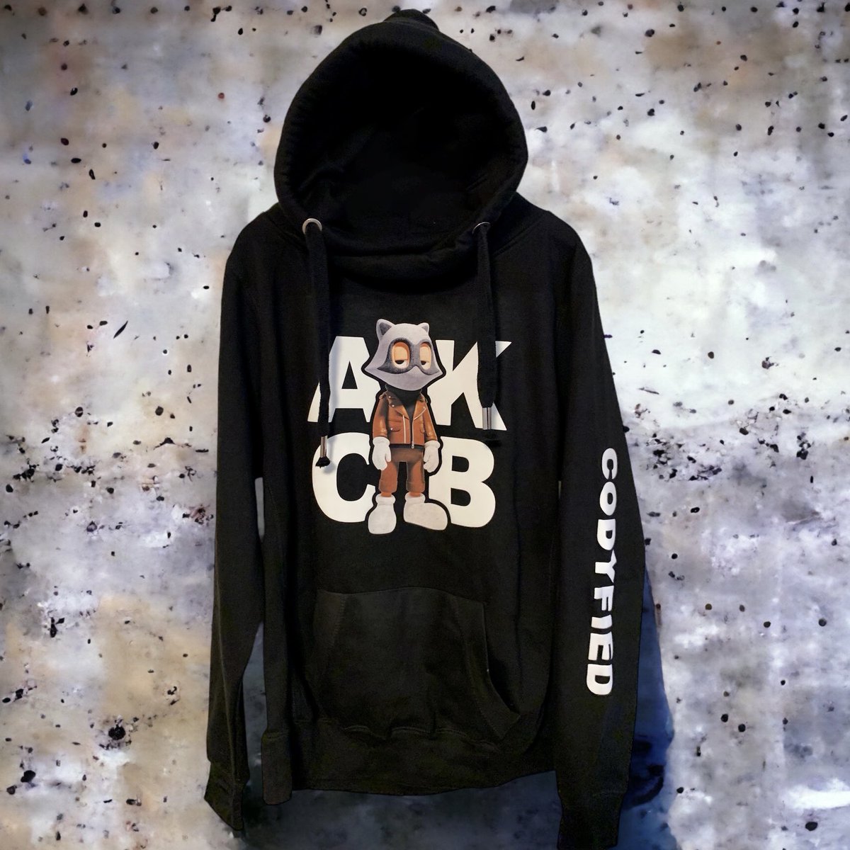 BEASTIEmerch's tweet photo. Custom hoodie for our friend @codybayne using his #akcb NFT on the chest and his name on the sleeve all with PUFF INK details on text. @akidcalledbeast #BAGMI https://t.co/pEdz9bs7SW