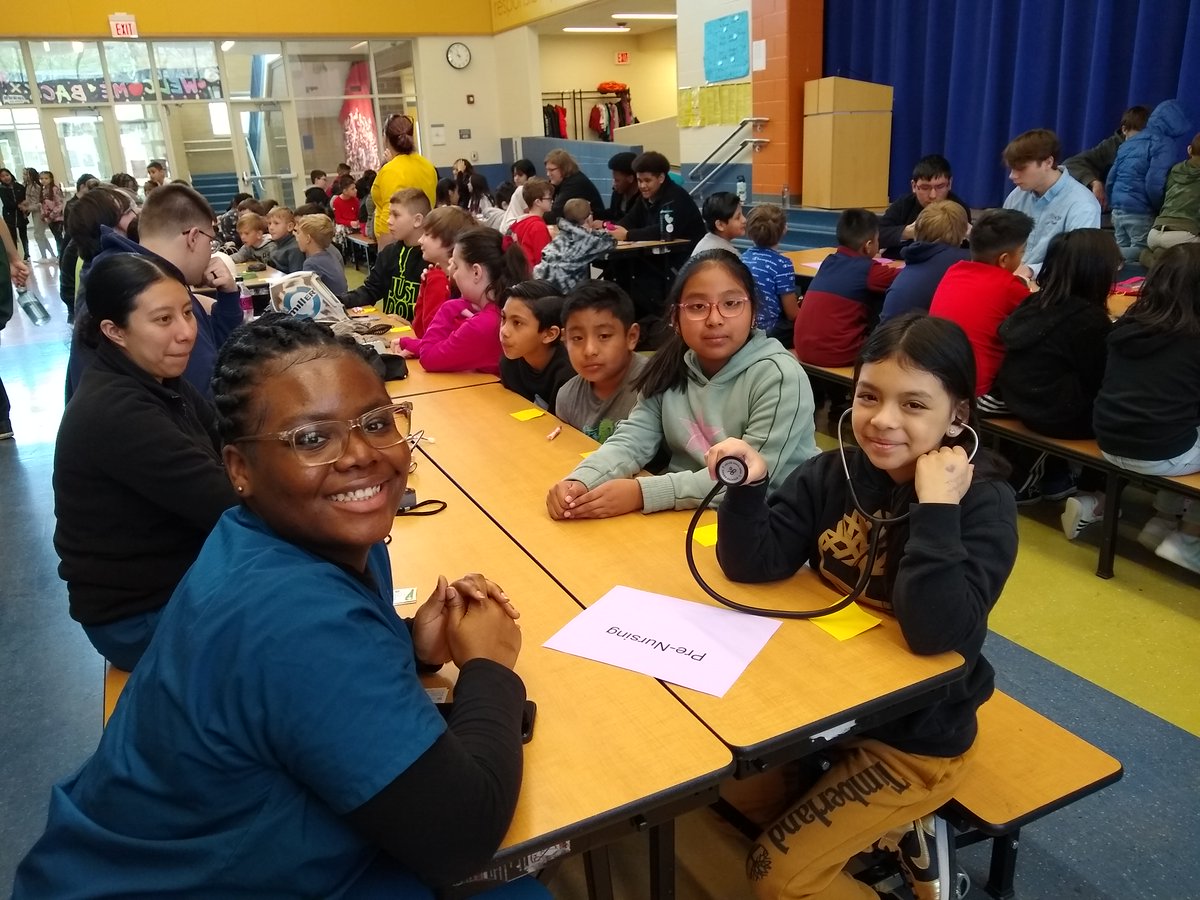 Senior English students had a great time visiting <a href="/PLES_Cardinal/">Prairie Lincoln Elementary School</a> students and playing games that showed them careers they can choose to study when they get into high school.  The young students also used some items from the different labs to learn more about that career.