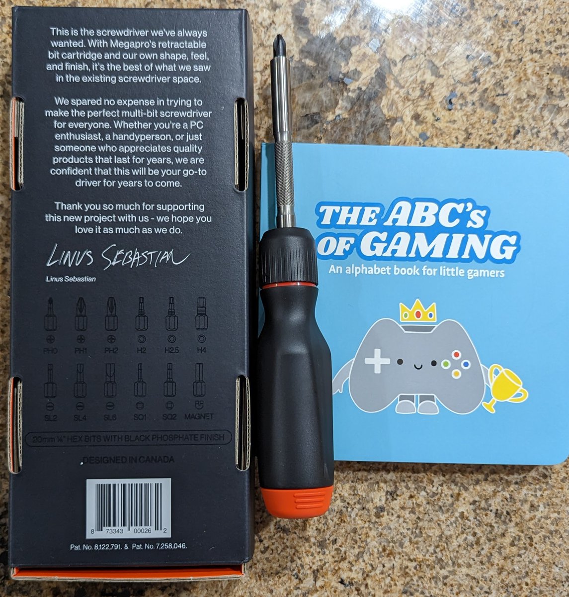 Urgo's tweet photo. Last week @LinusTech was hacked. Thankfully he got it straightened out, but while he was working on that figured it was the perfect time to order his screwdriver & children's book. Jonah loves both lol. Thank you @linusgsebastian! #LittleEngineer #BabyEngineer #LittleGamer https://t.co/PwUAtWZ0NP