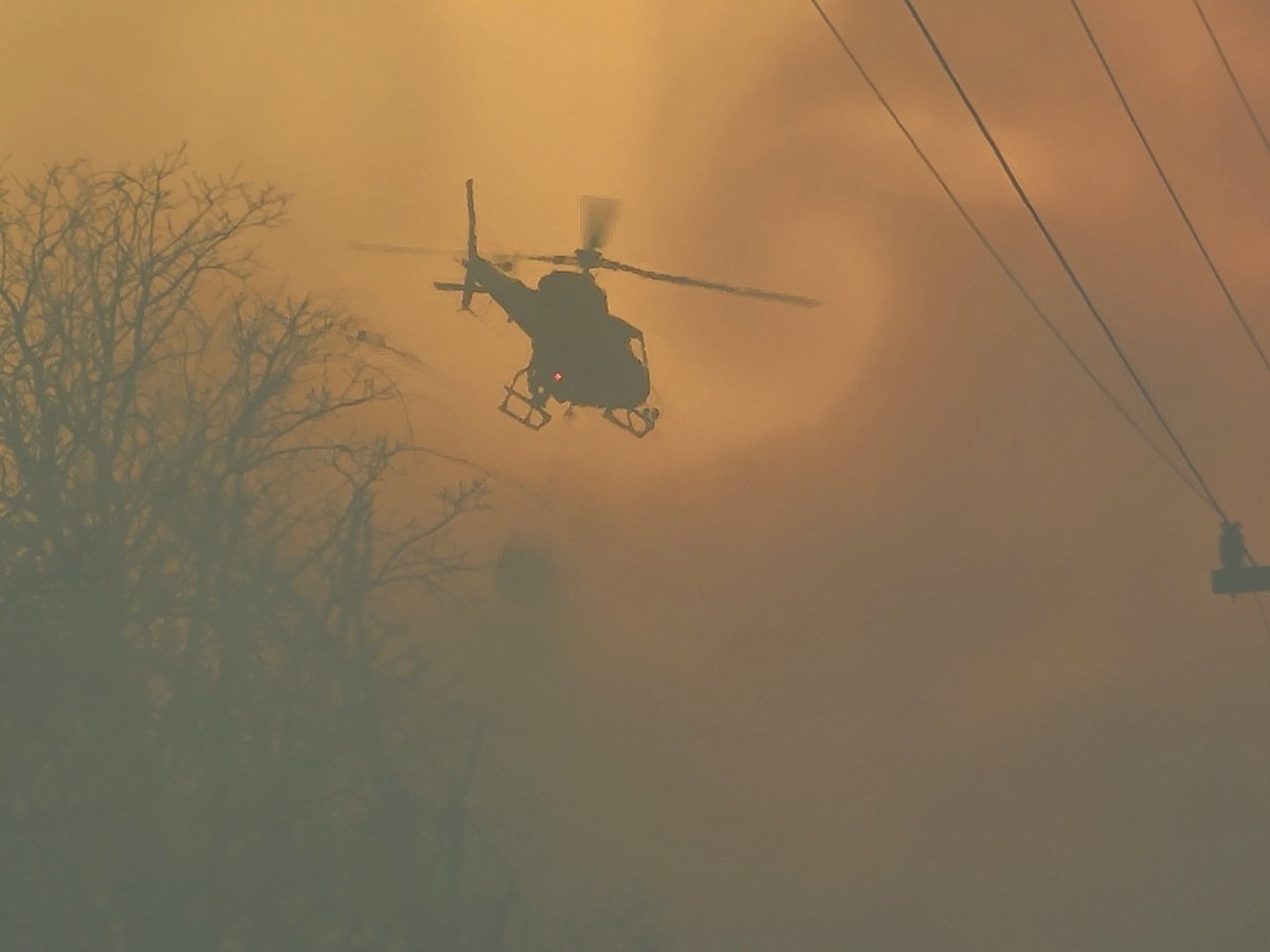 Aaron_Brackett's tweet photo. .@OKCPD chopper dropping water on Luther fire! @kfor #okwx https://t.co/up4XsnDiLo