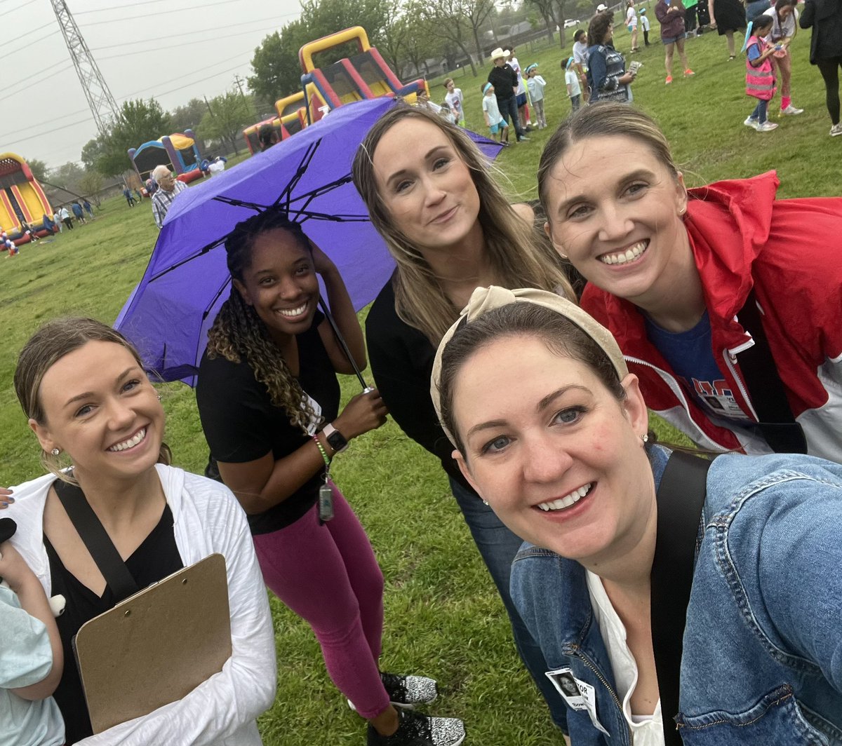 This group of @BowiePta #RISDPreK moms braved the rain, mud and (eventually) sun to support our littles on their first Field Day! #RISDBelieves