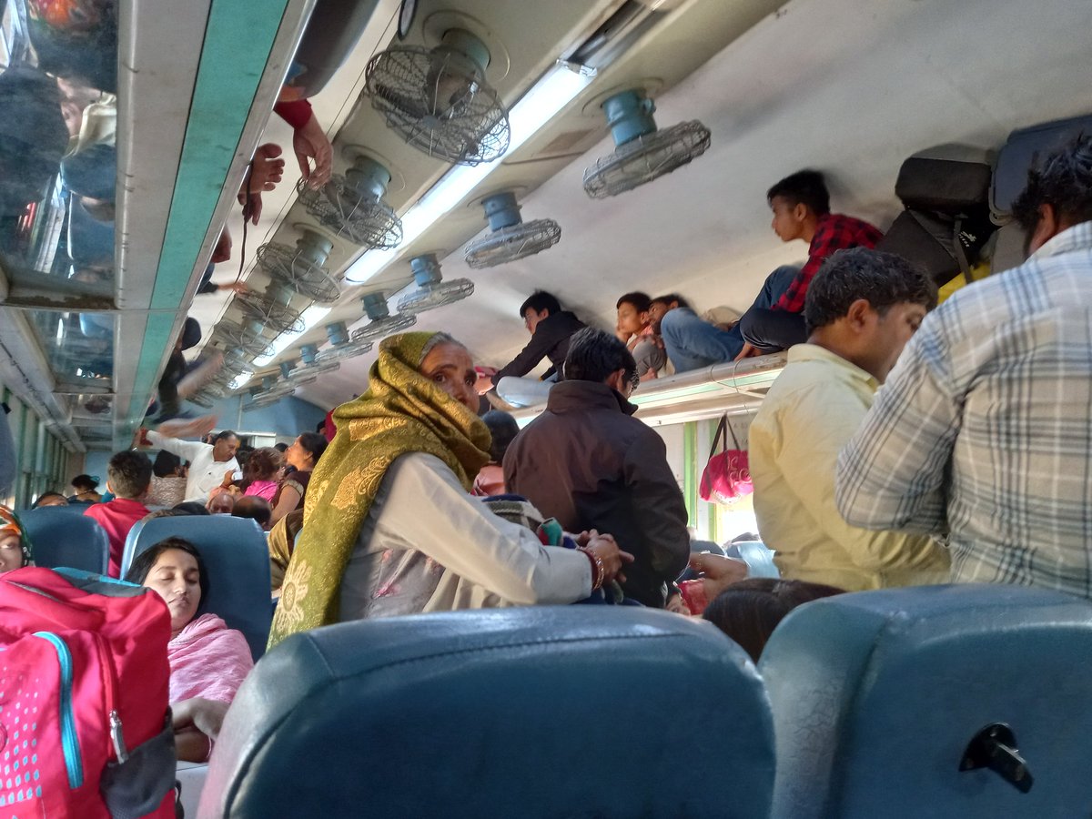 arpit_2707's tweet photo. @RailMinIndia @AshwiniVaishnaw  Travelling through 12065. Extreme rush. People not able to reach their reserved seats due to unruly behavior of people travelling on unreserved tickets. Pathetic conditions. No ticket checkers to control it. This is quite usual for this train. https://t.co/IYMRxm72Zb