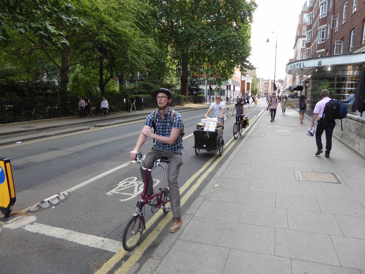 paulgannonbike's tweet photo. @JohnNailsPearce @MayorofLondon @TfL I spoke to the guy on the cargo bike. He was delivering stuff for a small chain of coffee shops. Previously it was done by van which was more expensive, so they chose a more efficient and easier way of delivering their supplies rather than your recommended ideologist's approach. https://t.co/AAx772snG2