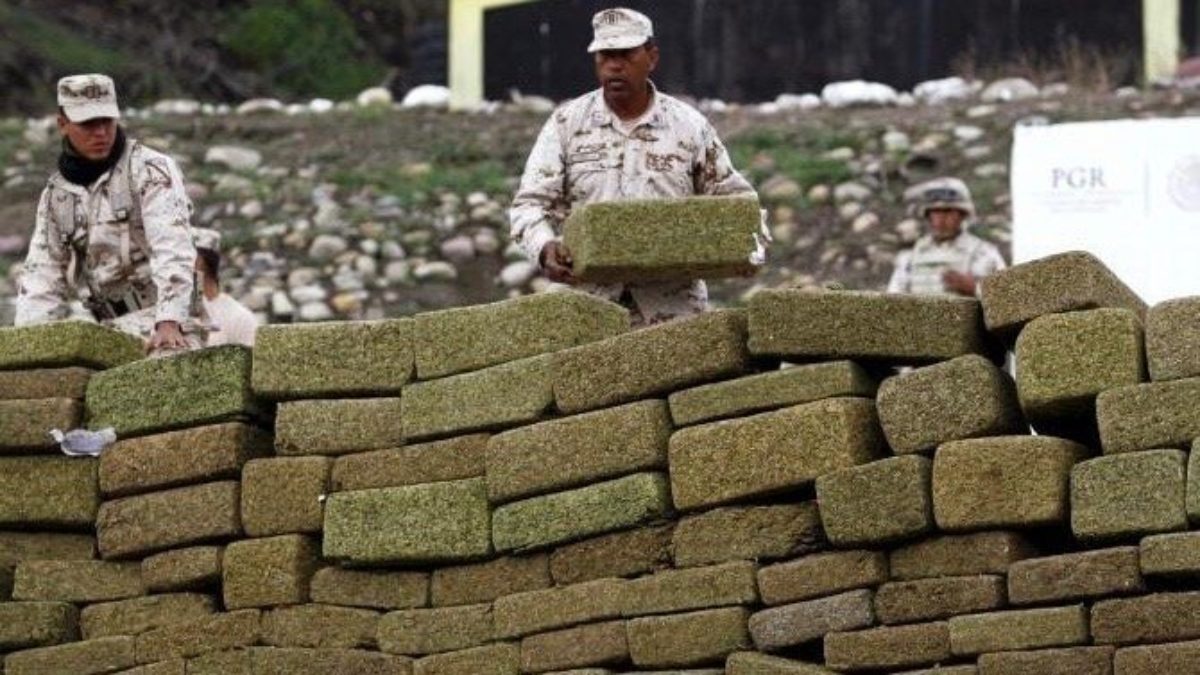 theloudsmoke's tweet photo. In response to the US War on Drugs, the Mexican government has begun construction on their own border wall.  Seized drugs from cartel groups across the country are being used to construct an "impenetrable, but unfortunately highly flammable wall." https://t.co/qaLttFB8Bt