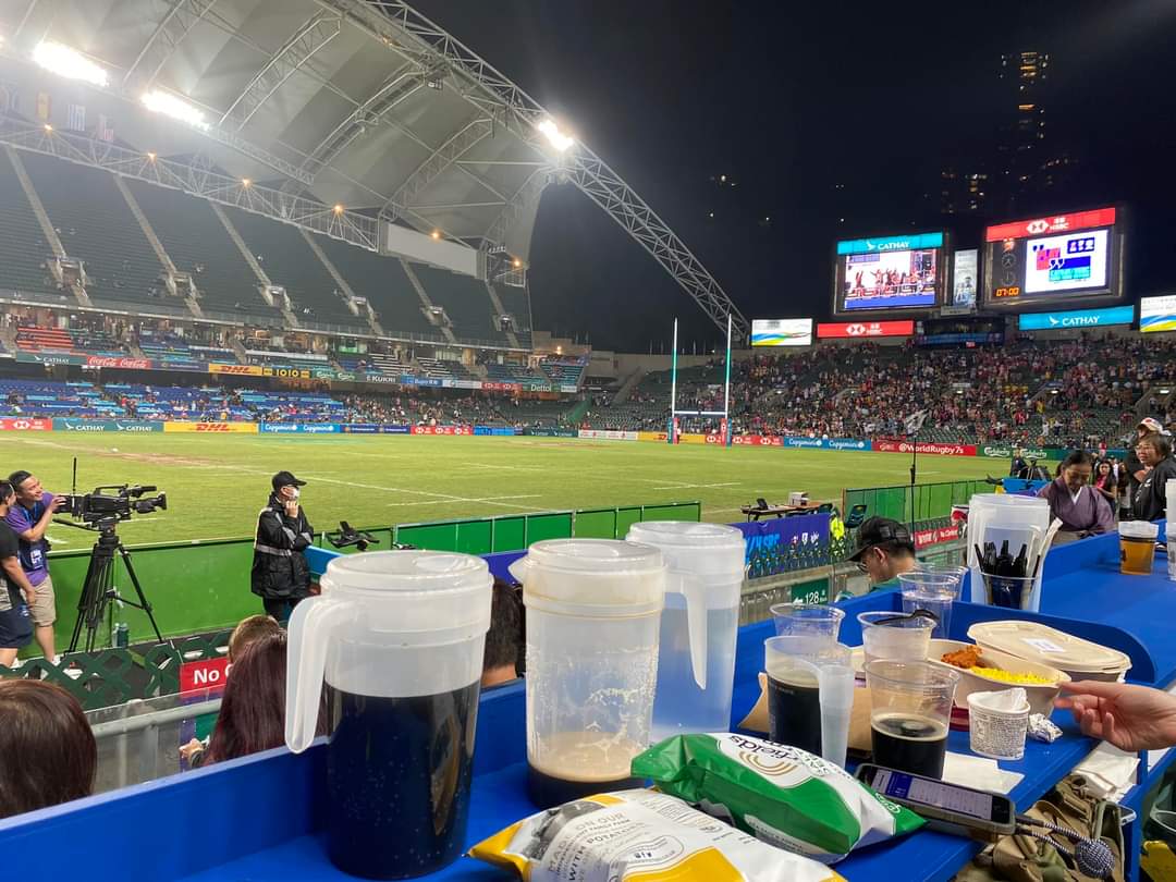 michaelmohk's tweet photo. Expats have gone, high rollers won't come back. This is how the #hk7s tried to make the #HongKong studium not so empty - Switching rows of seats as tables for booze &amp; snacks. 
They can't fool everyone. Even the south stand isn't full! A dreadful scene compared to pre-2019. https://t.co/8SyztDtTnx
