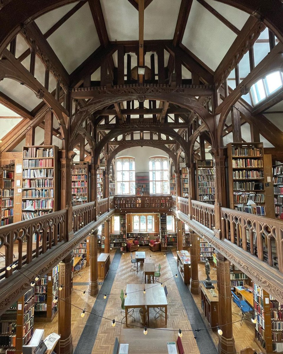 Perspective from one end of the Theology Room. The galleries, pillars and roof beams run at diagonals to the far wall