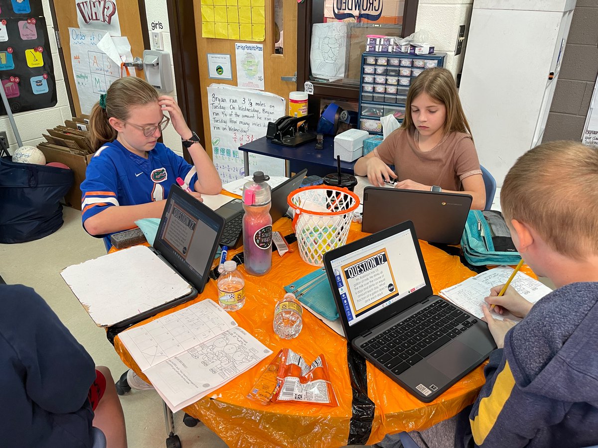 WJESClarke5th's tweet photo. March Madness always brings the engagement.  These kids had to determine my shooting percentages at UNG and compare them to the GOATs (MJ and Kobe).  We read about how Newton’s Law relates to Lebron dunking and solved LOTS of math, ELA, and reading questions. #successatjcss https://t.co/3aBp4rmS1t