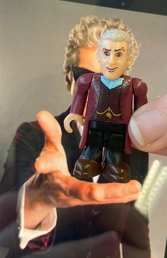 i brought my stupid twelfth doctor figure to comic con and he met michelle + matt :)