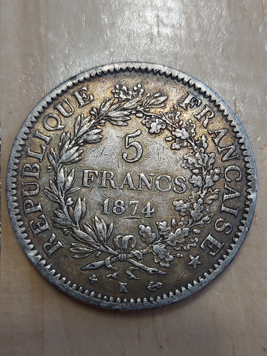 McCormark's tweet image. I love this 1874 5 francs. The reverse design came up a few times in the 1800s and again in the 1970s and in '94.  They liked Hercules, and I can't blame them, Disney did a good job on the 1997 film. Wild how the French knew about it in 1848