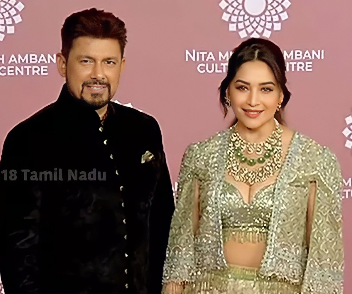 iam_rhiza's tweet photo. Our lovely couple. Nice seeing you both again together @DoctorNene sir and @MadhuriDixit mam. β€οΈβ€οΈβ€οΈ #MadhuriDixit #IdealCouple #BestRealLifeJodi https://t.co/IDzaisNCYp