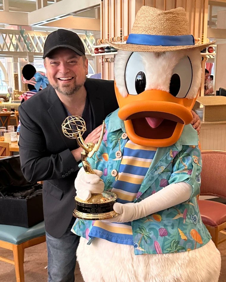ActorDanielRoss's tweet photo. So this just happened! I got to present #DonaldDuck with his very first #Emmy! He was very excited as was I 🥰 Video coming soon! 🦆 #actordanielross #disneyvoices #donaldduckvoice #voiceactor #emmywinner #capemaycafe @DisneyJunior @TelevisionAcad @DisneyParks @WaltDisneyWorld https://t.co/cu9X8qJk7S