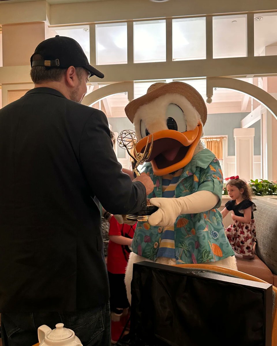ActorDanielRoss's tweet photo. So this just happened! I got to present #DonaldDuck with his very first #Emmy! He was very excited as was I 🥰 Video coming soon! 🦆 #actordanielross #disneyvoices #donaldduckvoice #voiceactor #emmywinner #capemaycafe @DisneyJunior @TelevisionAcad @DisneyParks @WaltDisneyWorld https://t.co/cu9X8qJk7S