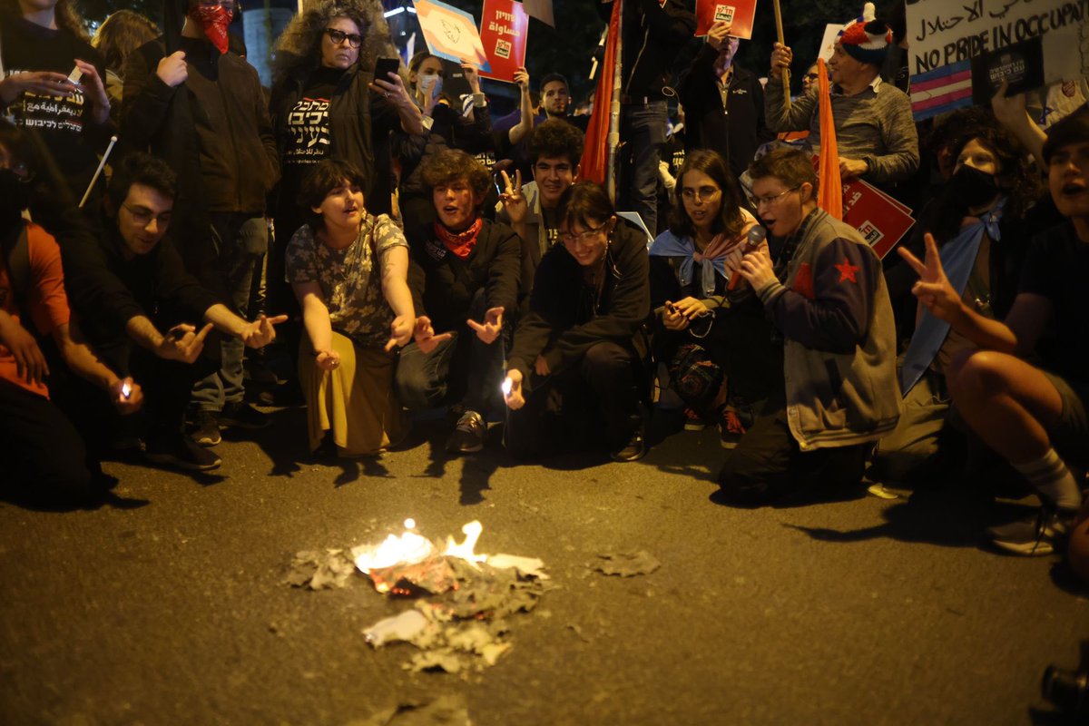 NOW: Israeli teens burn their conscription orders during the weekly anti-government protests in Tel Aviv. The teens released a statement in which they announced they will refuse to serve in the Israeli army to “protest Israel’s occupation and apartheid.”

📷: <a href="/OrenZiv_/">Oren Ziv</a>