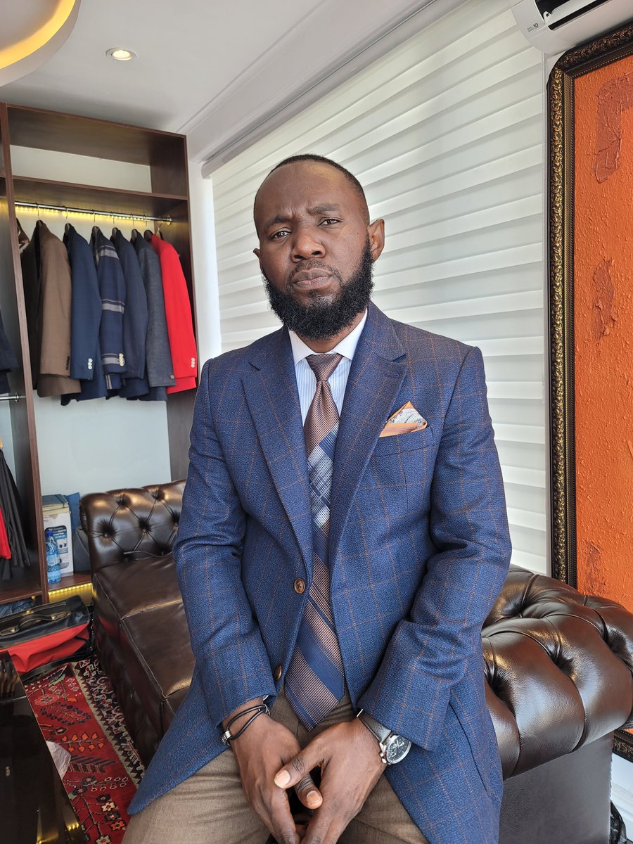 adklass's tweet photo. Blue windowpane notch lapel Jacket work over a brown flannel pants like a true #AdklassMan 
#bespoke #bespoketailoring #Lagos https://t.co/unaCk43JQD