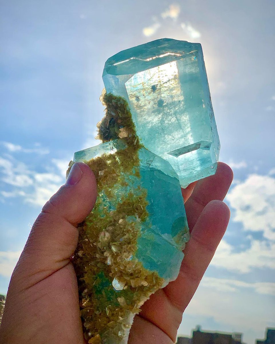 Sky Blue Colour Aqumarine combined With Golden Muscovite Mica From Nagar Nothern area of Pakistan.

Photo: geology_treasure