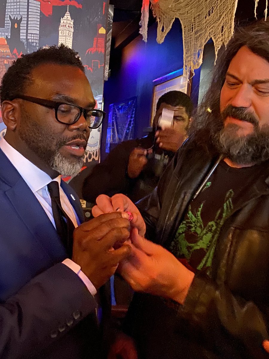 Last North Side stop is this D&amp;D themed bar where the owner got him to pose w the “20” face of the 20-sided die (it means an automatic win) and the bar labeled him a “chaotic good”