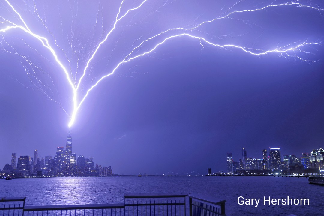 Lightning bolts stoke One World Trade Center during a thunderstorm in New York City, Saturday evening #newyork #newyorkcity #nyc @wtc #lightning #thunderstorm @agreatbigcity @_WTCOfficial