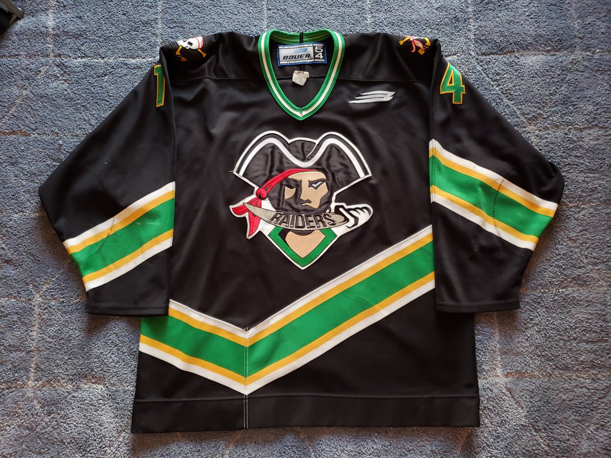 2RogueDubRacks's tweet photo. Jersey of the week is from @PARaidersHockey. This 2000-01 black was worn by winger Kyle Bruce. This is one of the longest hanging members of the racks, having been acquired from the team at the end of that season. https://t.co/1AGbgiGBji