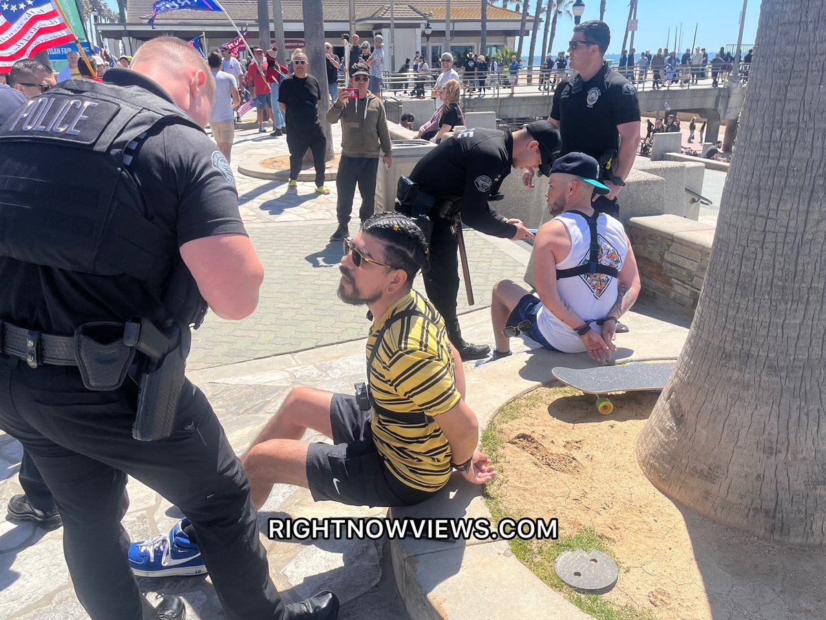Right_Now_Views's tweet image. Trump supporter Nick Taurus was hit over the head with a skateboard in Huntington Beach and taken away by ambulance. Two were arrested at the scene. #Indictment #Trump2024 #TrumpIndictment #DonaldTrump #Maga2024 #maga #huntingtonbeach #trumprally #OrangeCounty