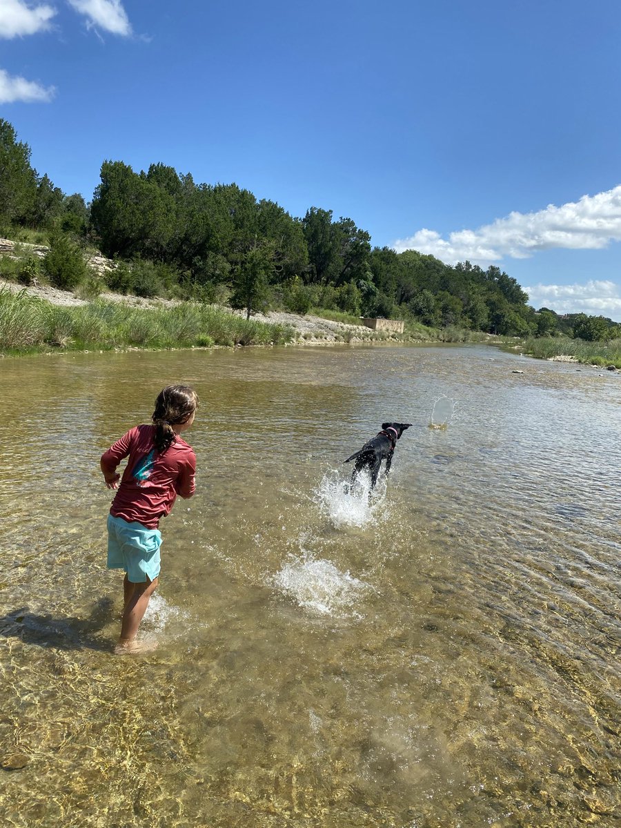 A girl, her lab, the river.