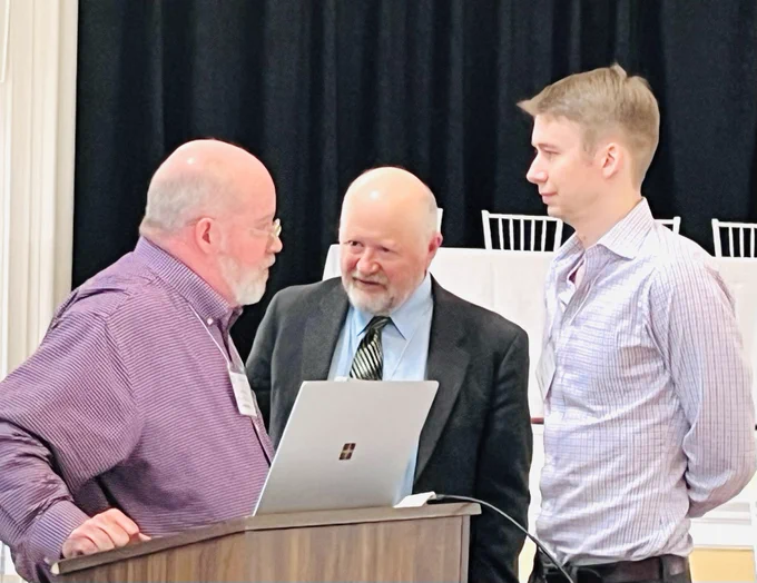 Simon Danner and Simon Giszter (Drexel) speak with Keith Tansey (University of Mississippi)