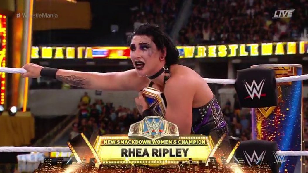 WrestleOps's tweet photo. Rhea Ripley finally defeats Charlotte to become the NEW SmackDown Women’s Champion.

Absolutely tremendous match, credit where credit is due.

And Rhea’s ‘redemption story’ is finally complete.

#WrestleMania https://t.co/UksxafXHjZ
