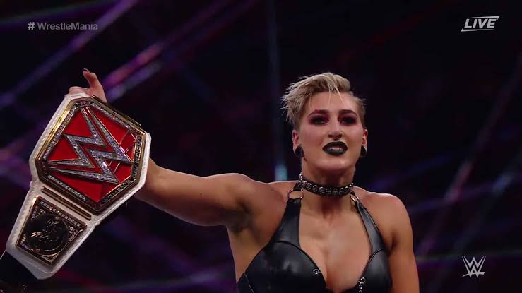 SKWrestling_'s tweet photo. GRAND SLAM RHEA!! ⚖️
#WWE #WrestleMania #RheaRipley https://t.co/gxrffRQHsU