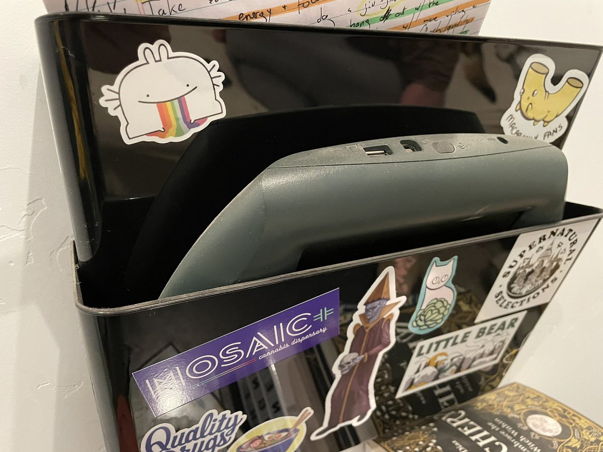 wratherton's tweet photo. @meganroseruiz My wife and I both love your art. Got myself this print and got her a bunch of stickers which adorn my writing station and her water bottle. Always love to see these little guys. Hope you feel better soon 💜 https://t.co/h368vwZwJO