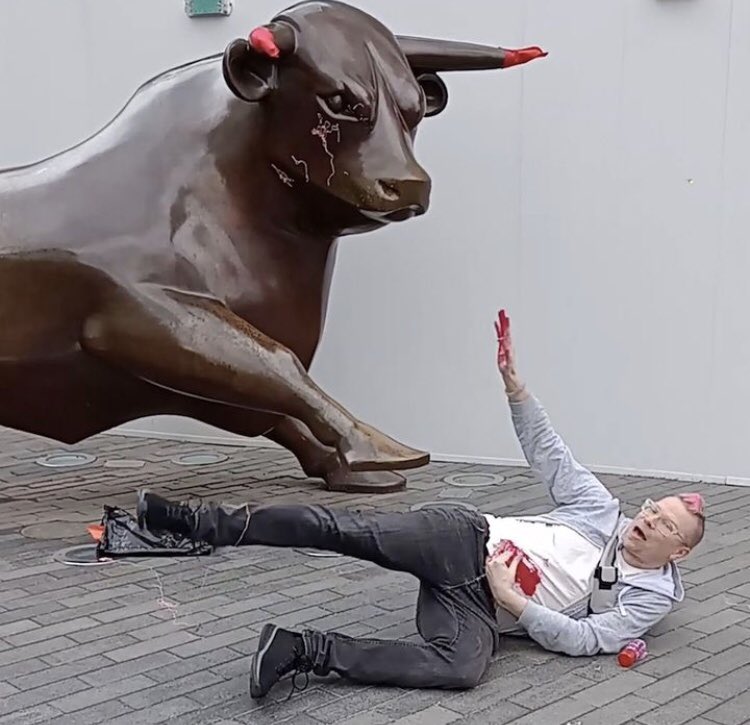JoelStories's tweet photo. Shocking - Local man attacked and gored by the Birmingham bull statue just for mentioning 'degrowth' and @doughnuteconomics - The bull's sentient, it’s alive! Late stage capitalism strikes again #bullringbirmingham #degrowth #sustainability #bullshxt #fool #thefool 😊 https://t.co/waKE0LOSSD